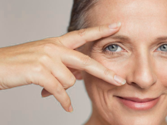 Women with fingers around eye